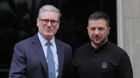 PA Media Ukrainian President Volodymyr Zelensky is greeted by Prime Minister Sir Keir Starmer as he arrives in Downing Street, London, ahead of meetings with the Prime Minister and Nato Secretary General Mark Rutte, at number 10.