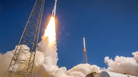 EPA A rocket takes off and leaves clouds of smoke on the ground