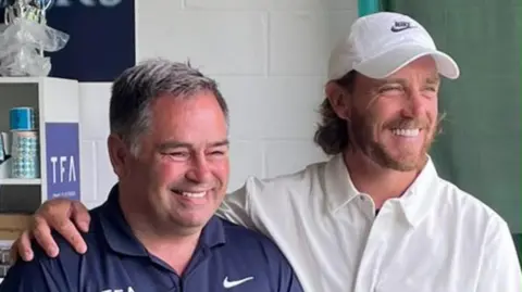 Norman Marshall Fleetwood and Marshall stand together smiling 