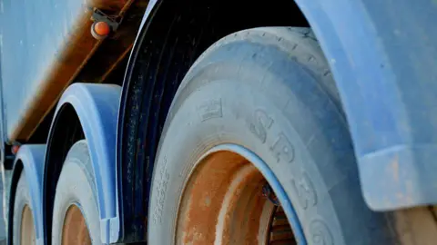 A library picture of the wheels of a heavy goods vehicle. 