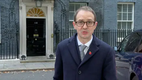 Chris Mason standing outside Downing Street