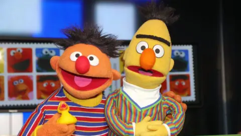 Sesame Street characters Bert and Ernie pose during the presentation of the NDR and Deutsche Post commemorative stamp of 'Sesamstrasse' on March 2, 2020 in Hamburg, Germany.