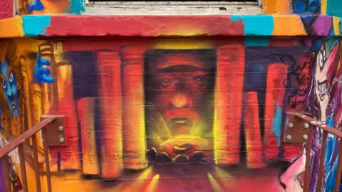 Painting of gandalf the grey looking at the one ring