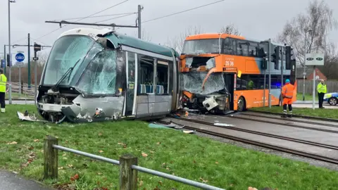 A crashed tram and bus 