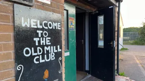 The entrance to the Old Mill Social Club.