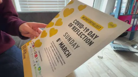 A flyer advertising the Covid-19 Day of Reflection. It features yellow hearts.