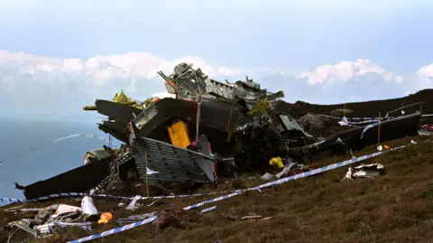 PA Media File photo dated 04/06/94 of the wreckage of the RAF Chinook helicopter, which crashed on the Mull of Kintyre on June 2, 1994 killing all 29 on board, including 25 top Northern Ireland security experts.