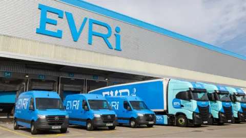 PA Media Undated handout photo issued by Evri of their liveried vehicles by a distribution centre. Parcel delivery company Evri is rolling out 10,000 lockers across the UK as the popularity of away-from-home delivery booms. The "smart lockers" will be accessible 24 hours a day, seven days a week, and can be used for both pick-up and drop-off, Evri said. Issue date: Monday June 30, 2025.