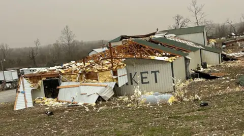 Missouri State Trooper Damage from a tornado woven on Friday night in Missouri