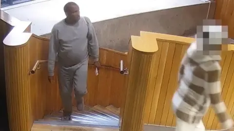 PA Media Handout grab from CCTV issued by the Metropolitan Police of Hadush Gerberslasie Kebatu (left) in Dalston on October 24, 2025.