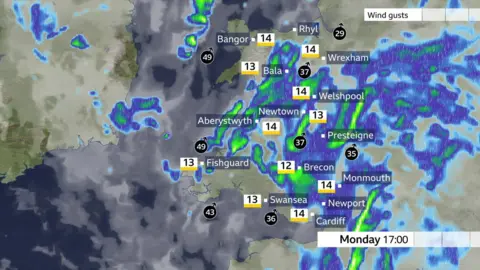 A map showing heavy rainfall in most of Wales at 17:00 GMT apart from south west and north west Wales.