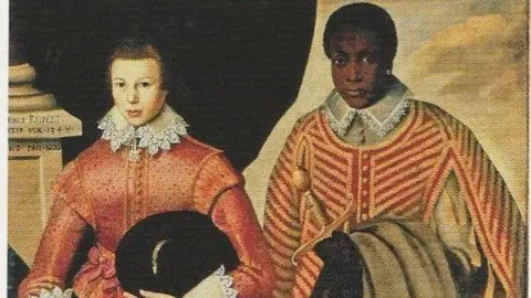 A 1626 painting of two teenage boys, one is white and the other black. The white boy is slightly shorter, and both are standing in similar positions. They are similarly dressed in formal dress appropriate to the period. 