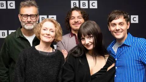 (Left to right) Hugh Dennis, Claire Skinner, Daniel Roche, Ramona Marquez and Tyger Drew Honey, at a photocall for The Outnumbered Christmas Special, coming to BBC One and iPlayer on Boxing Day at 9:40pm, at BBC Broadcasting House in London. P