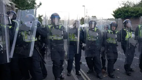 Screen grab taken from PA Video of police and protestors clashing in Southampton during a protest following the death of Henry Nowak.