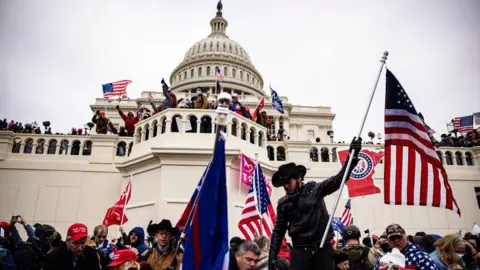 Pro-Trump supporters storm the U.S. Capitol following a rally with President Donald Trump on January 6, 2021 in Washington, DC. Trump supporters gathered in the nation's capital today to protest the ratification of President-elect Joe Biden's Electoral College victory over President Trump in the 2020 election. 