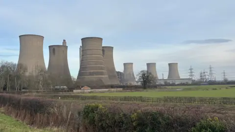 BBC The former West Burton A power station near Retford is pictured in front of green fields