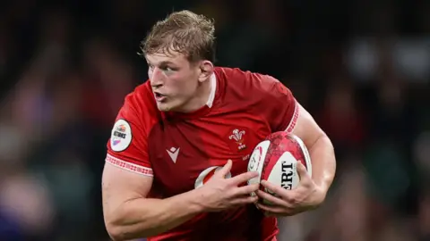 Jac Morgan in action for Wales