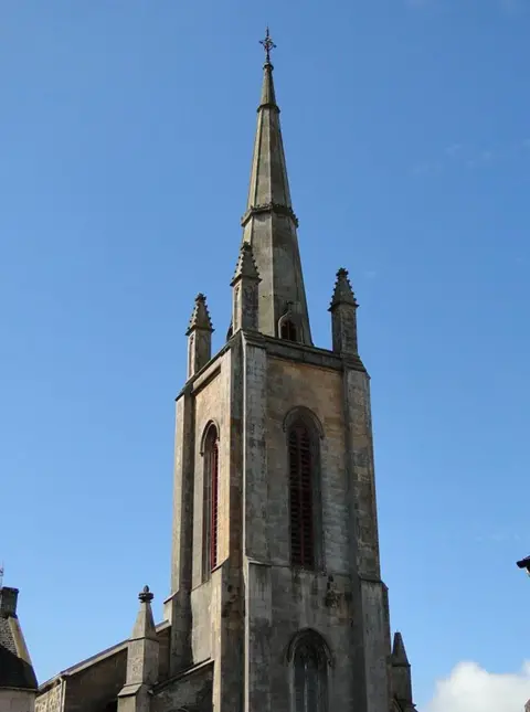Scotland's Churches Trust The image features a tower of the Trinity Church in Rothesay. The building is in English style with a three-stage angle-buttressed tower to the front. 