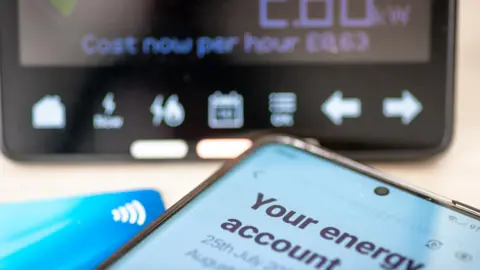 Phone, payment card and energy display