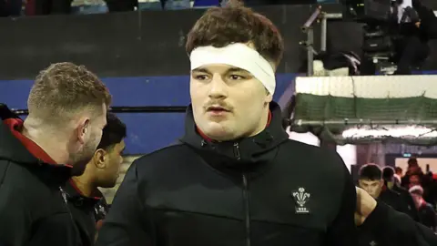 Deian Gwynne leads Wales Under-20s out at Cardiff Arms Park