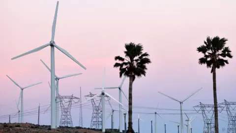 Wind turbines operate at a wind farm on March 05, 2024 near Palm Springs, California. 