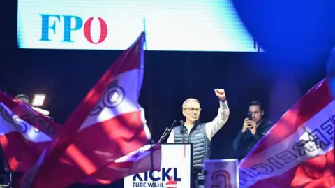 JOE KLAMAR/AFP Chairman and top candidate of the Freedom Party of Austria (FPOe) Herbert Kickl speaks during an election rally at Stephansplatz in Vienna, Austria on September 27, 2024