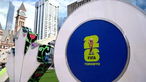 The Toronto sign decorated with FIFA World Cup graphics is seen at Nathan Phillips Square 