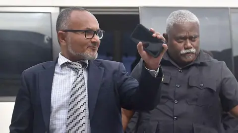 Matthew Wale, seen here waving while arriving at the parliament house, in an earlier picture