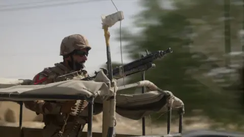 A Pakistani soldier is part of the military convoy escorting the BBC in Quetta