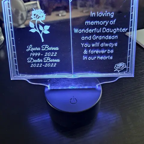 Jennifer Barnes A light in memory of Laura Barnes and her son Dexter