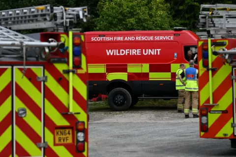 Scottish Fire and Rescue Service firefighters from the Wildfire Unit in Nethy Bridge, close to the wildfire in the Cairngorms National