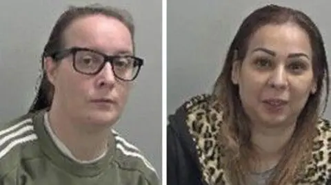 Warwickshire Police Two mugshots of two woman. On the left, Byrne has dark hair tied back and black glasses. On the right, Kaur has long dark brown hair with lighter brown ombre and is wearing a cheetah print coat