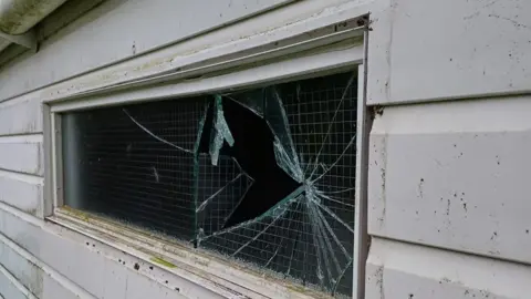 Castor and Ailsworth Cricket Club Smashed up window 
