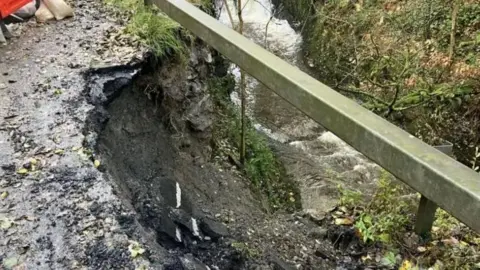 In November 2023, part of a wall beneath the A470 near Talerddig in Powys collapsed into a river, leaving a hole on the side of the road. 