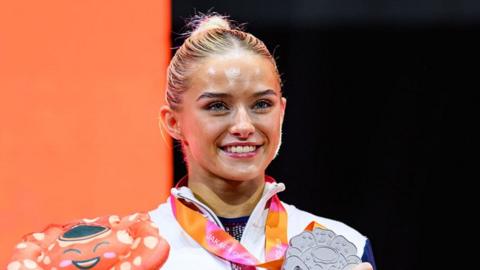 Female athletes hit back at 'w