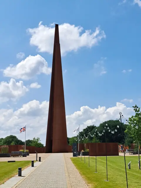 IBCC A 31m (102ft) high memorial spire, which is made of steel, lies at the heart of International Bomber Command Centre 