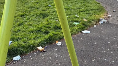 Sally Anne Litter in a children's play park