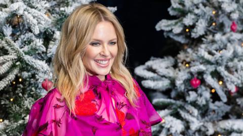 Kylie Minogue's Race for Christmas Number One: Can She Beat Wham?