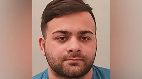 Police handout Police photo of Junaid Khan