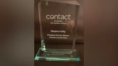 Louise Howcutt A glass trophy.