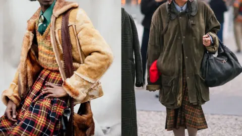 Getty Images Man wearing a kilt, shirt and tie with a wool jumper on the left and woman on the right wearing a tartan skirt with a khaki raincoat