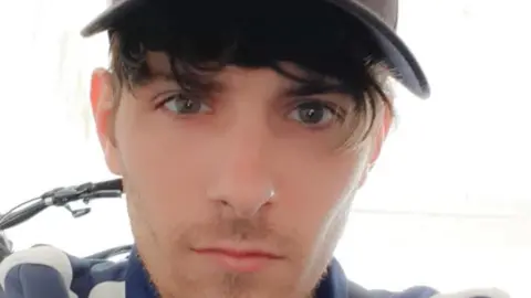 Naomi Lewis Picture of Justin Lewis 