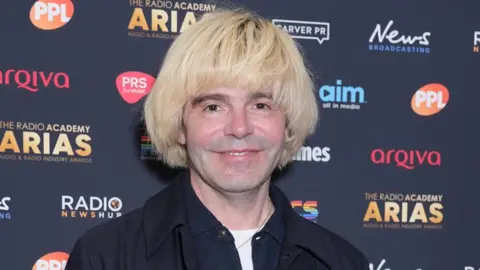 PA Media Tim Burgess from the Charlatans attending the Radio Academy ARIAS at the Theatre Royal Drury Lane, London
