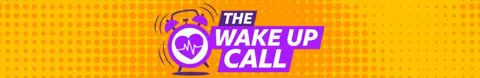 The Wake Up Call logo in purple and white, which includes and alarm clock with a heart with a pulse like through it on its face, on a yellow backgroud with orange circles on it. 