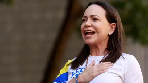 REUTERS/Leonardo Fernandez Viloria Venezuelan opposition leader Maria Corina Machado gestures at a protest ahead of the Friday inauguration of President Nicolas Maduro for his third term, in Caracas, Venezuela January 9, 2025