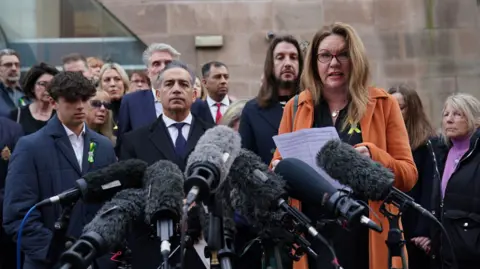 PA Media Families of the bereaved victims of the Nottingham Attacks standing outside Nottingham Crown Court following Valdo Calocane's sentencing in January 2024