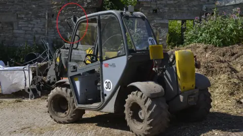 HSE/PA Media Telehandler in farmyard