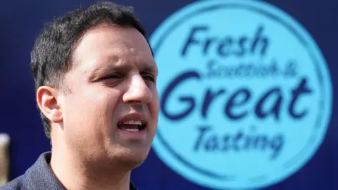 PA Media Anas Sarwar at a dairy farm