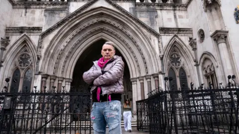 Ecotricity founder Dale Vince outside the Royal Courts of Justice, in London, where a judgement over how money should be split in his divorce from ex-wife Kate Vince, which was granted last month, was made