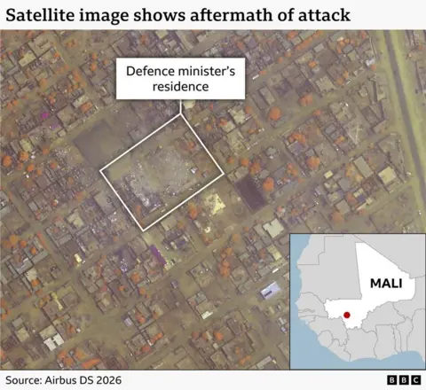 A satellite images showing the location of the defence minister's home and showing the damage caused by the attack. 